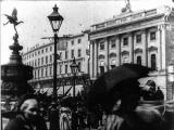 Leisurely Pedestrians, Open Topped Buses and Hansom Cabs with Trotting Horses